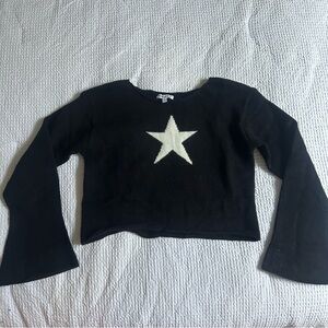 Elegant Black Sweater with White Star by [Brand]